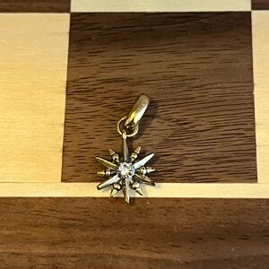 Kendra Scott starburst charm in gold